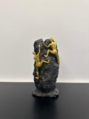 2 Persons Climbing on a Mountain